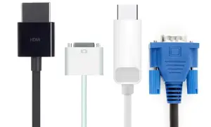 Porównanie złączy: czarny HDMI, biały Mini DisplayPort, biały USB-C i niebieski VGA. Wybór między DisplayPort vs HDMI zależy od potrzeb.