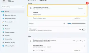 Ustawienia dźwięku w Windows 11, gdzie widać opcje wyjściowe z Realtek Audio.