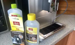 Płyn i tabletki Melitta Perfect Clean do odkamieniania ekspresu. Zestaw do czyszczenia ekspresu ciśnieniowego.