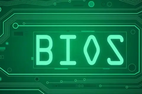 Zielona płyta główna z napisem BIOS. Symbolizuje podstawowy system wejścia/wyjścia, kluczowy dla działania komputera.