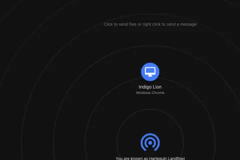 Interfejs airdrop. Widoczny komputer "Indigo Lion" i ikona sieci. Możliwość wysyłania plików lub wiadomości.