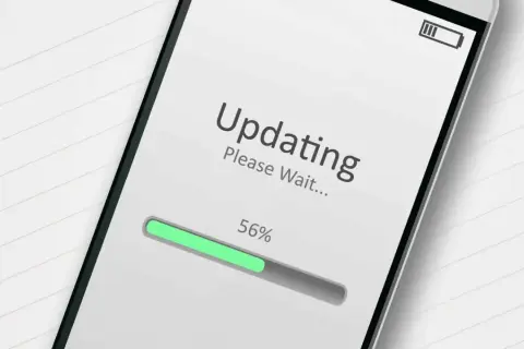 Ekran telefonu pokazuje postęp aktualizacji aplikacji. Proszę czekać, 56%.