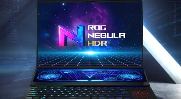 Laptop z ekranem **AMOLED** prezentuje logo ROG Nebula HDR na tle kosmosu i siatki. Dolny ekran pokazuje futurystyczne grafiki.