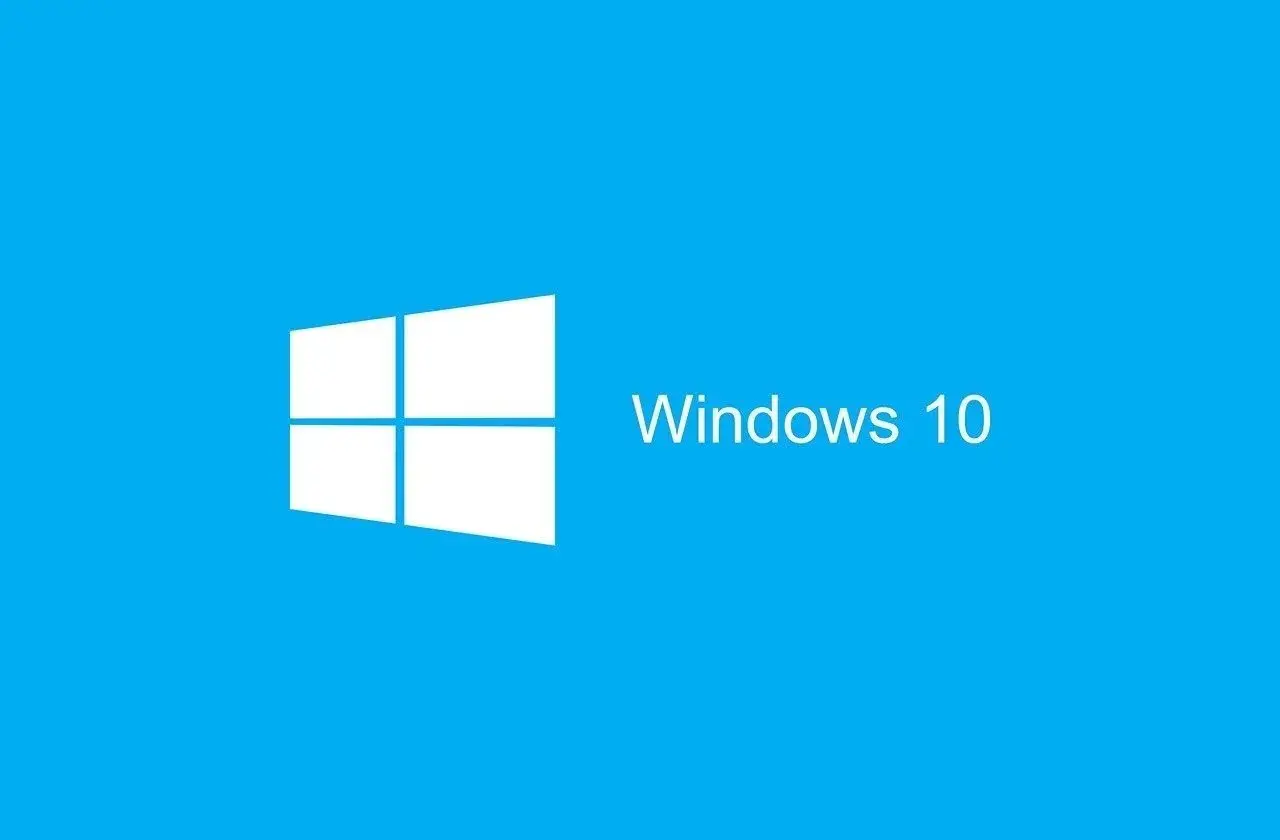 Logo Windows 10 na niebieskim tle. Czas na aktualizację systemu!
