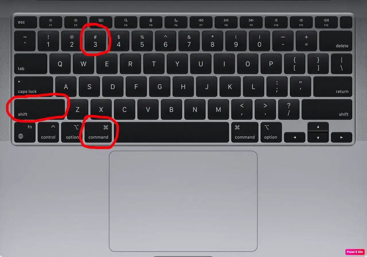Klawiatura MacBooka z zaznaczonymi klawiszami: Shift, Command i cyfrą 3.