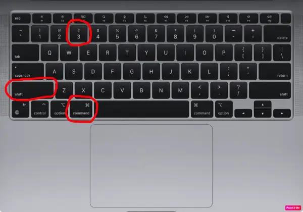 Klawiatura MacBooka z zaznaczonymi klawiszami: Shift, Command i cyfrą 3.
